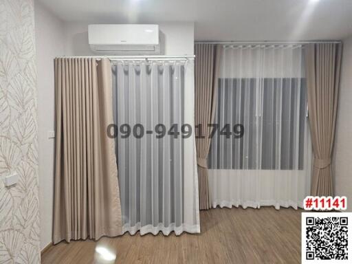 Modern bedroom interior with elegant curtains and air conditioning