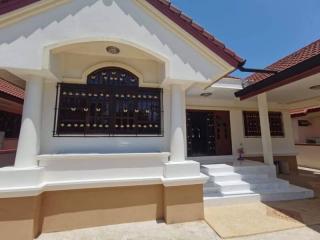 Contemporary styled entrance of a residential building with clear skies