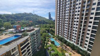 High-rise residential buildings with pool and greenery view