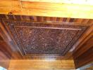 Intricate wooden ceiling and wall panels