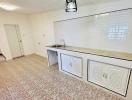 Spacious kitchen with modern finishes and natural light