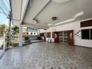 Spacious covered patio area of a residential building