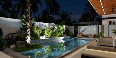 Luxurious private pool with ambient lighting in a modern home