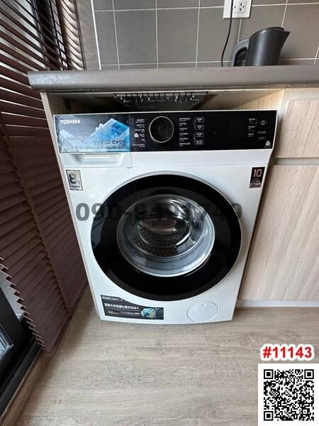 Modern Toshiba washing machine in a property