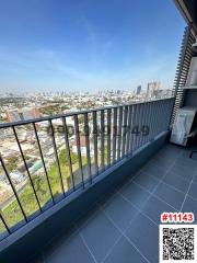 Spacious balcony with city view and tiled flooring