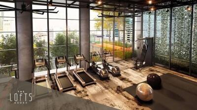 Modern gym facility with expansive windows in an urban apartment complex