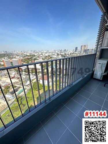 Spacious balcony with city skyline view