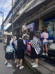 Students standing outside a city store