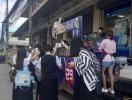 Students standing outside a city store