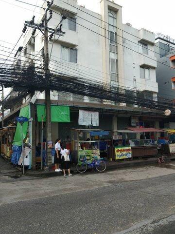 Commercial building front with street-level shops