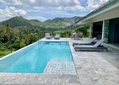 Luxury home with infinity pool and panoramic mountain views