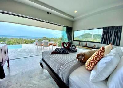 Spacious Bedroom with Ocean View and Access to Pool
