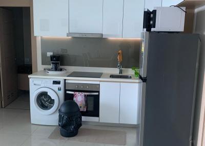 Modern kitchen with appliances and white cabinetry