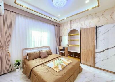 Elegant bedroom with modern design and ample lighting