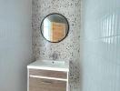 Contemporary bathroom with terrazzo flooring and a floating vanity