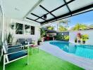 Spacious outdoor area with swimming pool and lounge seating