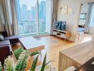 Spacious living room with modern furnishings and city view