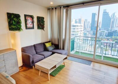 Cozy living room with modern furniture and city view