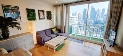 Cozy living room with modern furniture and city view