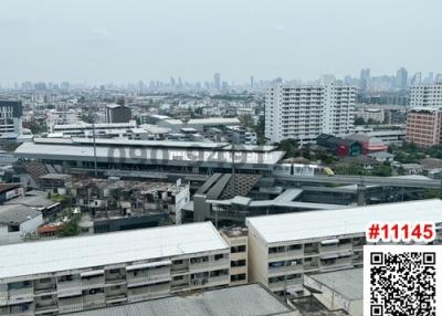 Cityscape view from high-rise building window