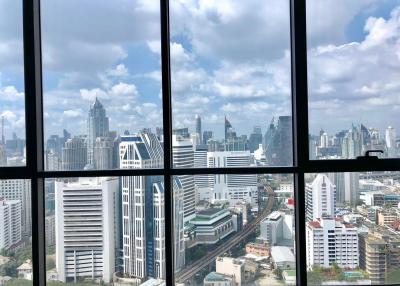 Panoramic city view from a high-rise apartment