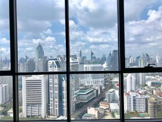 Panoramic city view from a high-rise apartment