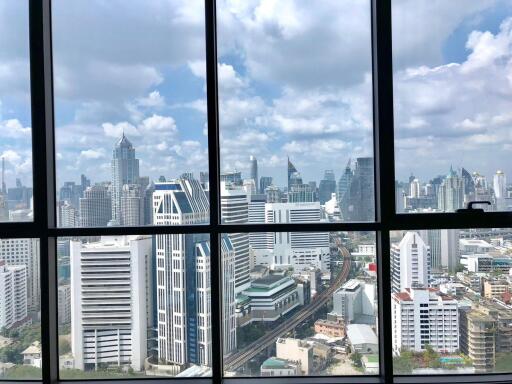 Panoramic city view from a high-rise apartment