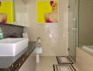 Modern bathroom interior with vibrant art decor