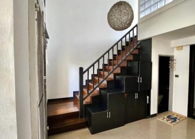 Modern staircase in a well-lit home interior