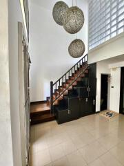 Modern staircase in a well-lit home interior