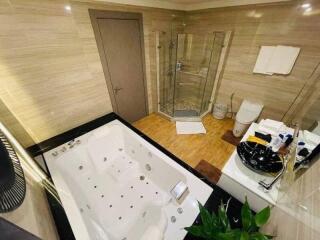 Modern bathroom with jacuzzi tub and walk-in shower