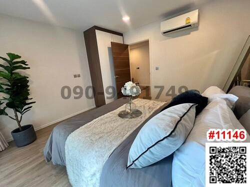 Cozy bedroom with wooden floor and modern design