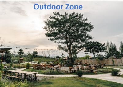 Spacious outdoor zone with seating and greenery