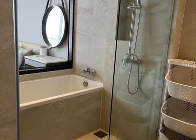 Modern bathroom interior with glass shower and elegant sink