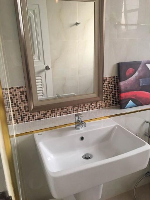 Modern bathroom interior with large sink and mirror