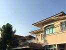 Suburban two-story house with clear blue sky