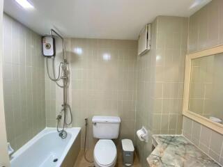 Compact bathroom with modern amenities