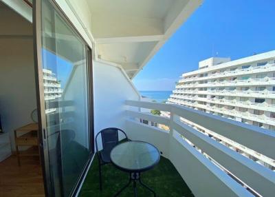 Balcony with ocean view and seating arrangement