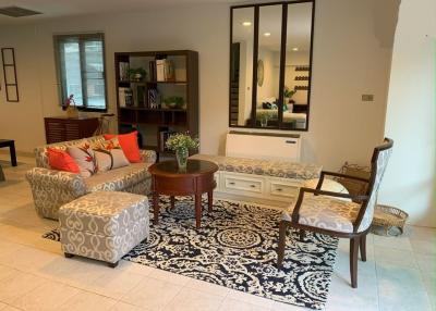 Cozy and well-furnished living room interior with comfortable seating and stylish decor
