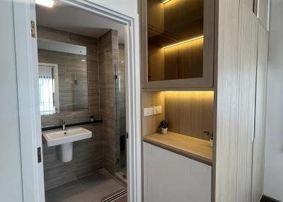 Modern bathroom with elegant cabinetry and lighting