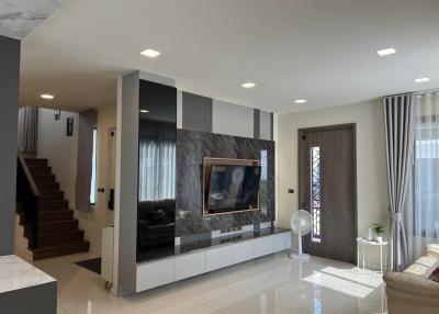 Spacious and modern living room with ample lighting