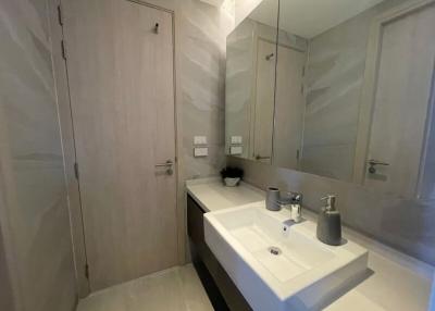 Modern bathroom interior with sink and mirrored cabinet