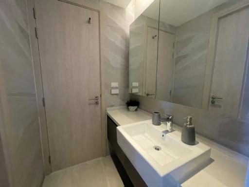 Modern bathroom interior with sink and mirrored cabinet