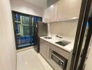Modern compact kitchen with glossy finish