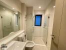 Modern bathroom interior with a shower, bathtub, and sink