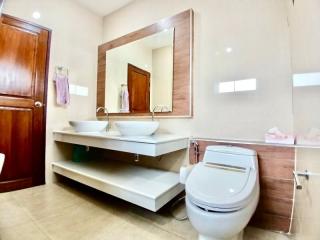 Modern bathroom with elegant fixtures and neutral tones