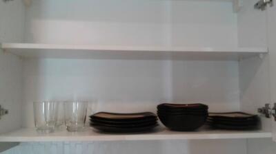 Kitchen shelf with dishes and glasses