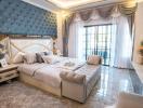 Luxurious bedroom with a large bed and elegant decor