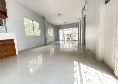 Spacious and bright living room with glossy tiled flooring