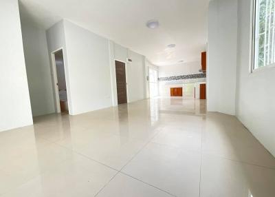 Spacious and brightly lit corridor inside a modern building